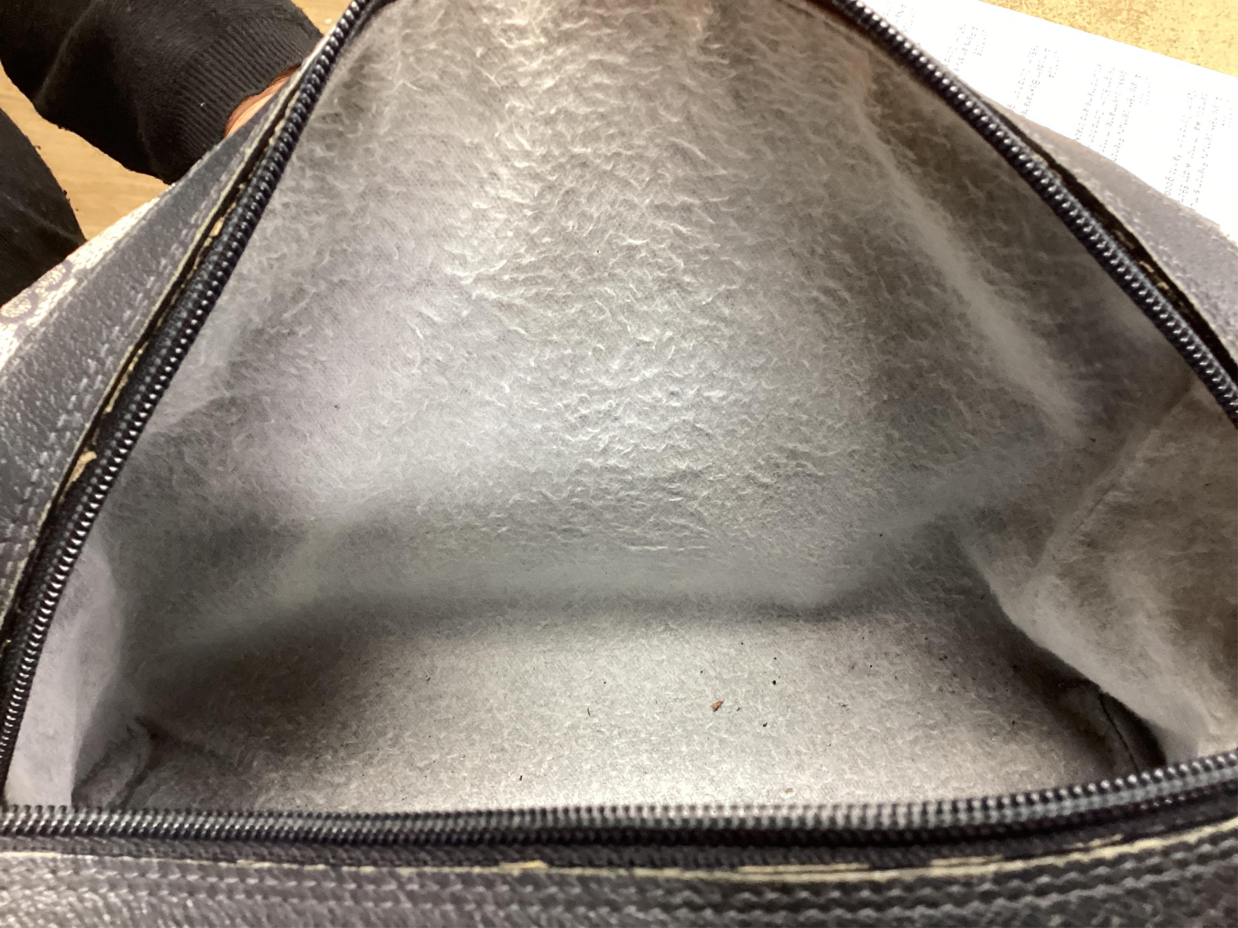 A Gucci monogram blue canvas handbag, wallet and purse